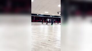 Roller skating up to a couple ladies