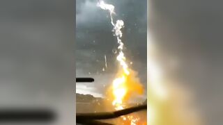 Car directly hit by lighting