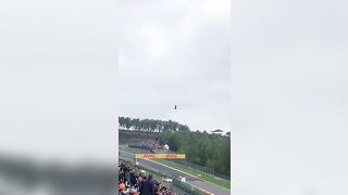 A guy with a jetpack going 200km/h above F1 cars at the qual