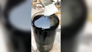 Paint removing solution in action