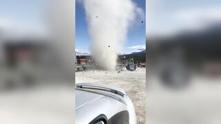 Dust devil destroys a fruit stand in Yukon, Canada