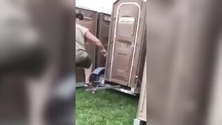 Drunk lady falls out of port-o-potty