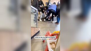 London: Two police officers are helpless against a group of violent youths at a McDonalds in Kingston