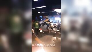 Two motorbike taxi drivers fight with passengers