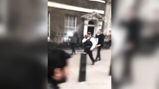 London, individuals attack a journalist and police officers