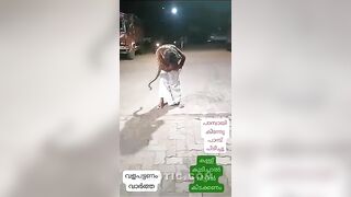 Python Strangles Street Performer