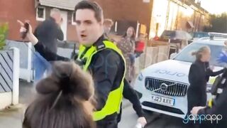 Female Leeds Officer Having Mental Breakdown, Pepper-Spraying a Crowd