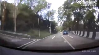 Dashcam shows the speeding car bursting into flames when going around a bend