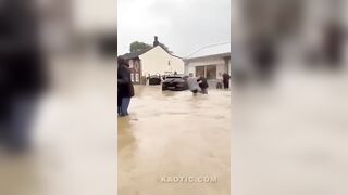 2 Guys Fight During a Flood