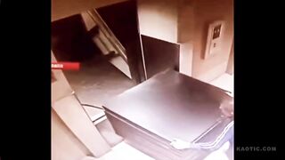 Worker gets pushed down elevator shaft while unloading(repost)