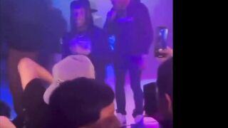 Goofy Guy Gets Lit Up For Flashing Gang Signs at Rap Show