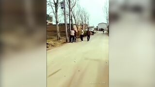 Chinese Villagers Fighting With Shovels