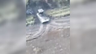 Invaders jumping of burning personnel carrier after it gets hit by FPV drone