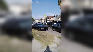 Police Chase Ends in Man's Front