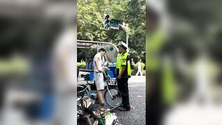 Cyclist Gets Into A Fight With Traffic Inspectors In China