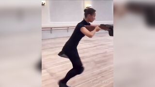 Russian Ballerina Performs With Submachine Gun