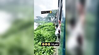 Dude stealing phones from train passengers in India