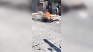 Another Criminal Set Ablaze In The Street Of Port Au Prince Haiti