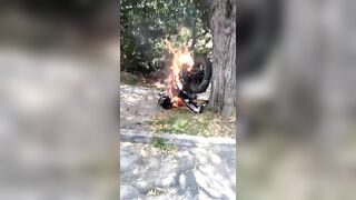 Thief Stripped, His Bike Set Ablaze