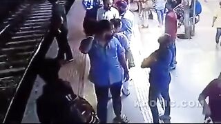 Bitch Slap Knocks Man into Path of Subway Train