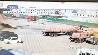 Worker Tries to Stop Truck. Fails Miserably