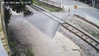 Scooter Woman Couldn't Beat The Train