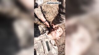 Armenian soldier cuts the ears of azeri(repost)