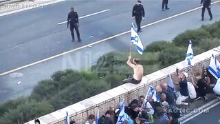 Protester Takes A Shower Away