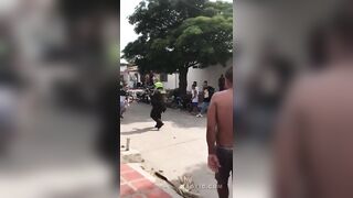 Another Angle Of Colombian Cop Shooting Man Armed With Rocks