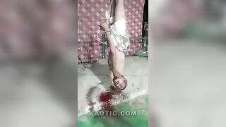 Man hung upside down to bleed out slowly.
