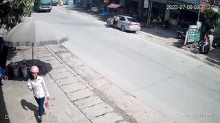 Vietnamese Biker Smeared Under Truck Wheels