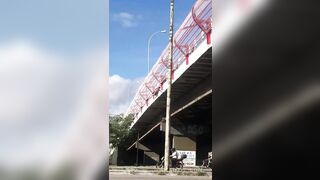 Desperate Woman Jumps From an Overpass
