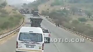 Speeding vehicle crashes onto another accident wreck)repost)