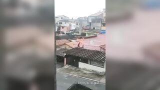 Thief Falls Thru The Roof During Police Chase In Brazil