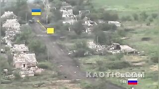 Russian tank destroys American armored vehicles, with Ukrainians