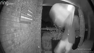 Texas:  person walking up to a door, grabbing a Pride sign and break