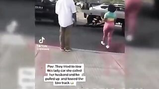 Husband prevents wife’s vehicle from being towed by towing the tow truck