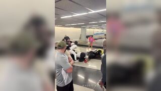 Chicago:  people fighting at O'Hare Airport, 2 charged