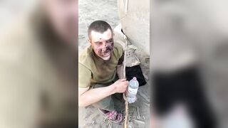 Russian POW with fucked up face taken by ukrainian troops