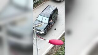 Man goes for a spin after road rage confrontation in China.