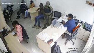 Ugandan Loan Shark Gets Lit Up by a Cop