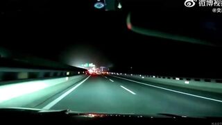 Semi Breaks Suddenly And Loses Giant Bolder, Rolls Over Car