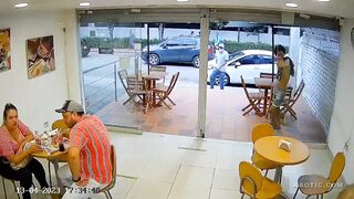 Colombian Cafeteria Robber Freaking Out