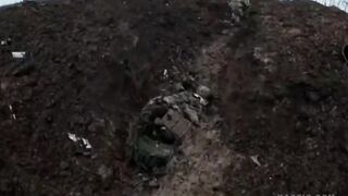 After meeting with Wagner fighters, Ukrainian fighters walk over the corpses of their compatriots