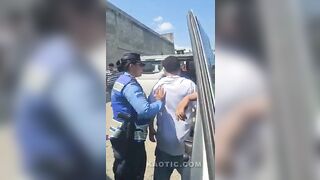 Two officers argue and slap drivers