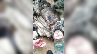 Interrogation of a captured, wounded Ukrainian militant