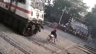 Elderly cyclist killed after getting struck by a train while trying to cross railway - India