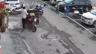 Child is launched after dropping lit firecracker into a sewer - Baise, China