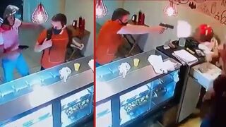 Customer fires shots at bakery robbers at close range and misses - Brazil