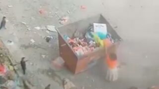 Young girl was crushed by a waste bin while searching for food